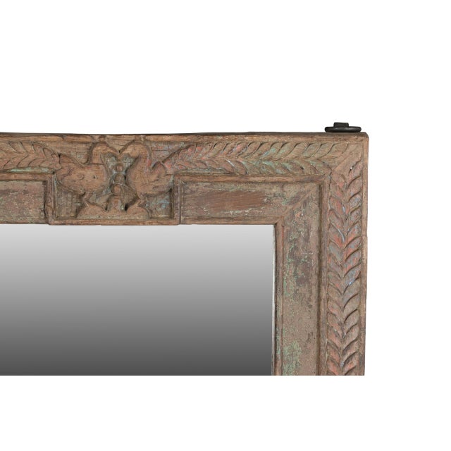 Antique Indian Carved Teak Mirror Frame, a naive carved small frame with peacocks facing each other in the center top, and...