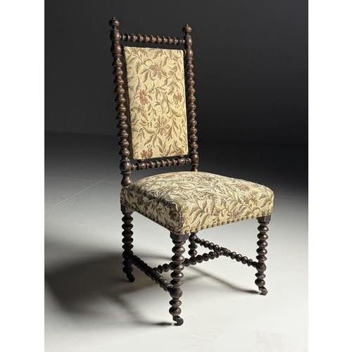 French Bobbin chair. Made of oak. Frame entirely in Bobbin motif. Circa 1880-1900. Upholstery shows some signs of wear....