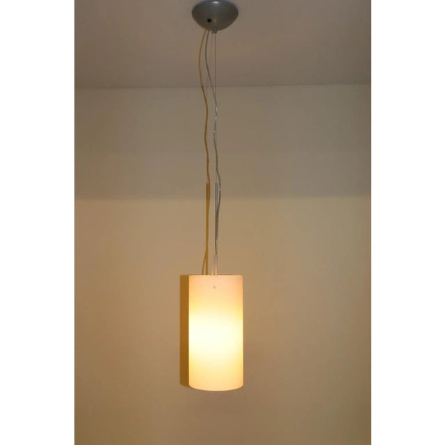 Murano Hand Blown White Glass Pendant Lamp. Mounting: lacquered grey metal. "Tube" was manufactured by Aureliano Toso....