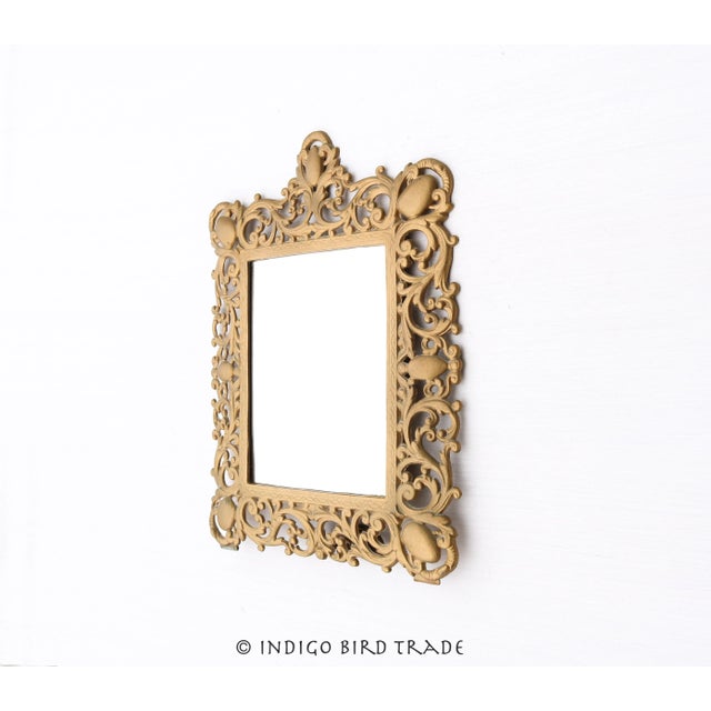 Antique Cast Metal Ornate Wall Mirror, c. late 1800s This stunning mirror is made from cast metal with gold finish that...