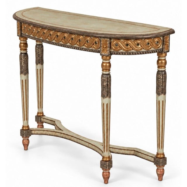 This is an Italian neoclassical style demilune console table featuring a pale green painted finish with a warm brown...