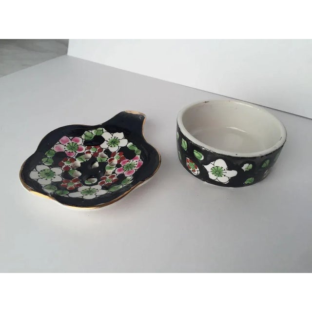 Vintage Elegant Floral Design Porcelain Tea Stainer and Holder , No Makers Mark. Dimensions :Stainer is 3.75"L X 3.25"W...