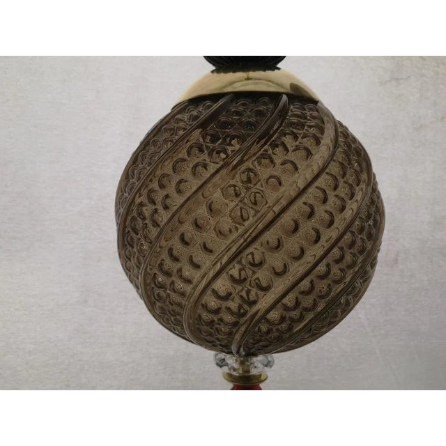 Precious Murano blown glass lanterns, its colors are unique ranging from smoked color to black through red one. It is very...