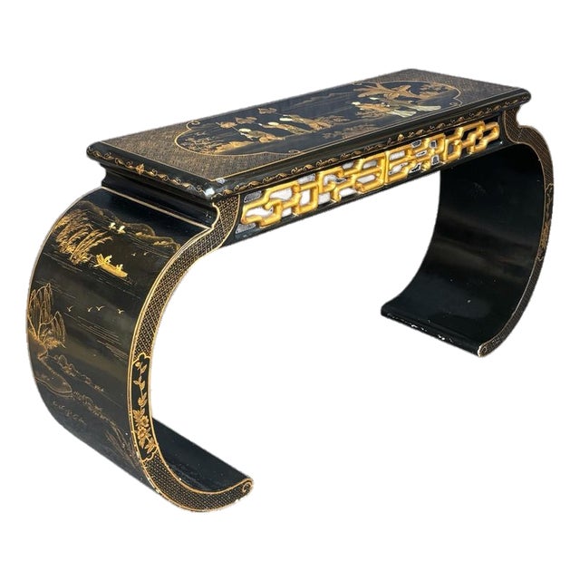 Late 20th Century Black Lacquer Chinoiserie Console Table With Gold Figural Decoration & Scroll Supports For Sale