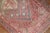A 20th Century narrow east turkestan khotan runner with an all-over geometric design on a pink field. Professionally...