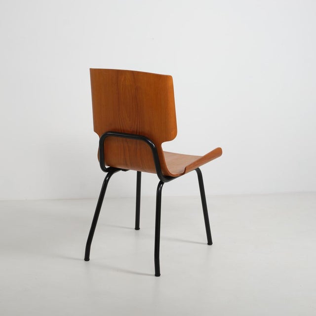 Elegant Italian design chair produced in the 1950s by Società Compensati Curvi, model 112. The chair features a...