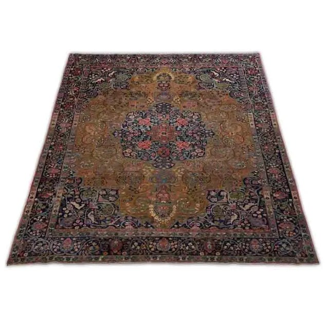 ACTUAL SIZE: 9’3″ x 12’1″ PRIMARY COLOR: Gold / Navy AGE: Old MATERIALS: Wool FOUNDATION: Cotton PRODUCTION: Handwoven,...