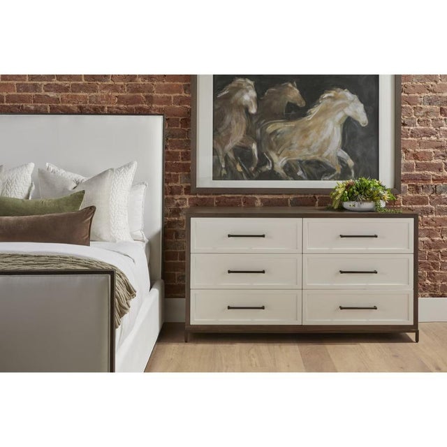 A double dresser offers six deep drawers in a generous horizontal frame, providing ample storage for clothing, linens, and...