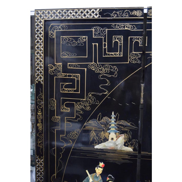 Each panel sharing portions of a larger scene completed in paint and faux semi-precious stones, depicting a pagoda to the...