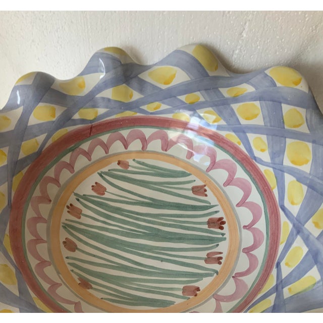 “Aalsmeer” pattern discontinued; ruffled edge, lattice pattern; central design element of tulips