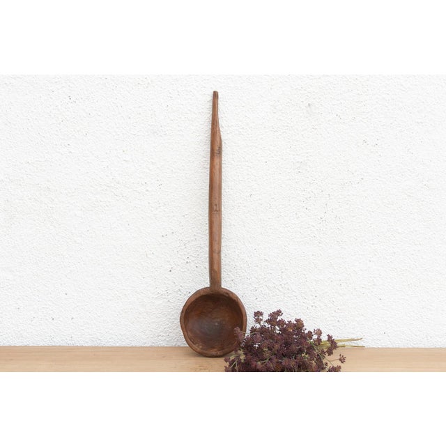 There is something deeply soulful about a simple wooden spoon—especially one carved by hand to feed a village. This...