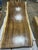 One tree. One top. One of one. A true single-slab live edge table: one continuous cross-section of a single Saman tree...