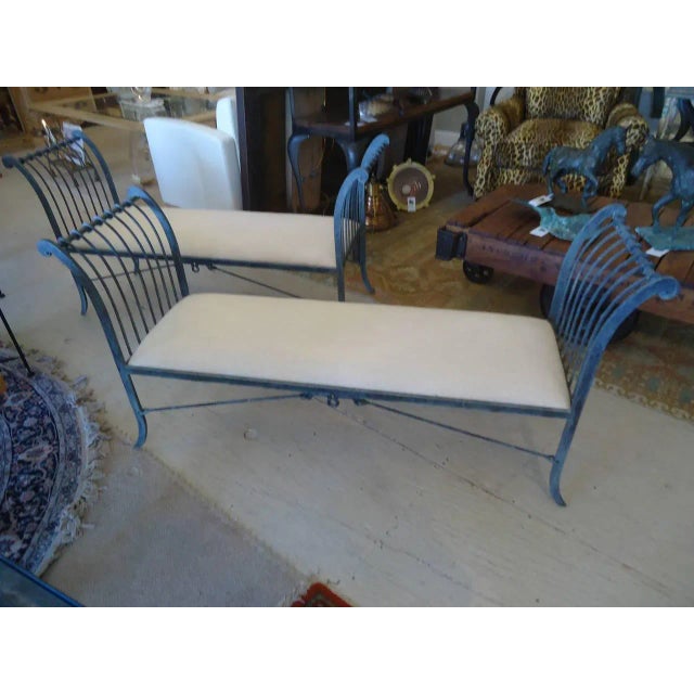 Two elegant iron benches with a gorgeous slate and blue/green patina, neoclassical style with criss cross stretchers and...