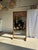 Very large freestanding teak mirror, of Indonesian origin. Rectangular frame in solid teak with a honey hue, visible...