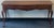 Elegant Ethan Allen Georgian Court console table crafted in rich cherry wood with a warm, polished finish. This classic...