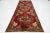 This beautiful 20th-century Persian Heriz Handmade wool rug has a red field with accents in tan and gray throughout the...