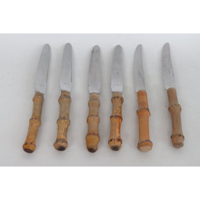 This lovely Set of 6 Fruit / Dessert Knives is made out of stainless steel. 4 of these beautiful knives are stamped "ED...