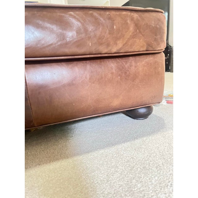 Restoration Hardware Lancaster Leather Coffee Ottoman upholstered in Antiqued Whiskey leather with standard fill. The...