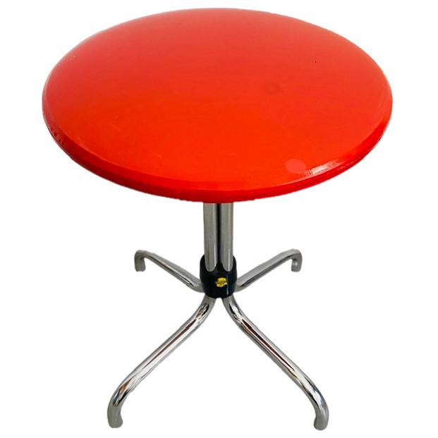This cute red stool from Brabantia has a chrome base. On the black part of the leg is a sticker of Brabantia. The seat is...