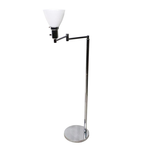 Pair of iconic Walter Von Nessen flex arm floor lamps, in chrome plate finish. These exceptional lamps are in very fine,...