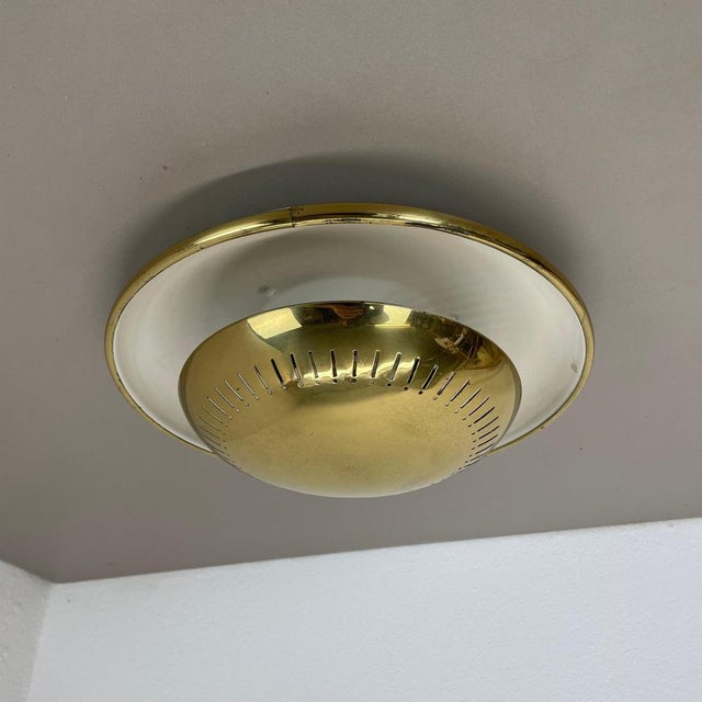 Article: brass ceiling light, flush mount also useable as wall light Origin: Italy Age: 1950s This vintage modernist light...