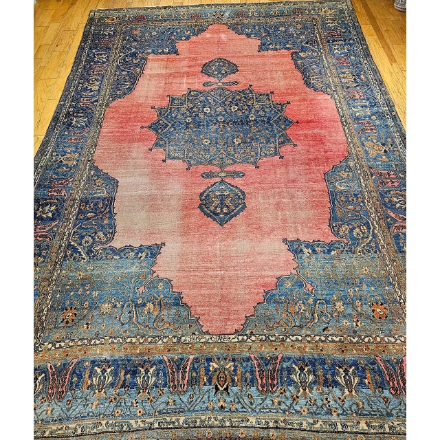 A grand and elegant statement piece, this 19th century Persian Khorassan rug showcases the timeless beauty of Persian...