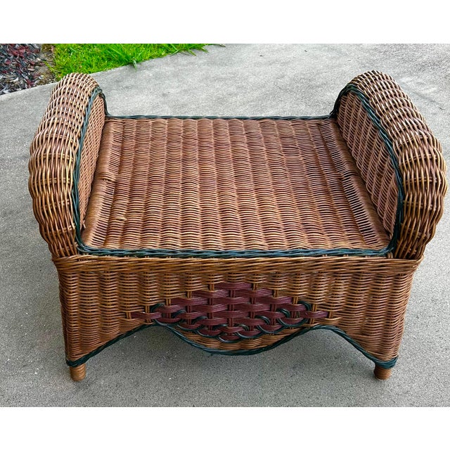 Vintage wicker ottoman with inserted patterns of dark red and green. Great size and in very good condition.