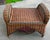Vintage wicker ottoman with inserted patterns of dark red and green. Great size and in very good condition.