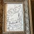 Original 4 x 6 black ink drawing on paper signed bottom right Overall size with tabletop frame is 7 x 9