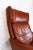 Easy chair upholstered with red brown elegance leather of Danish design from the 1970s. The chair is in great vintage...