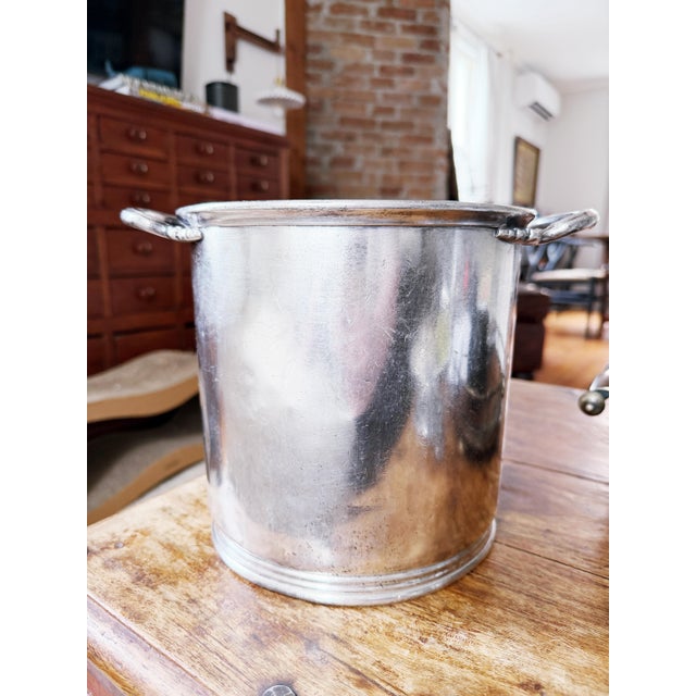A beautiful vintage circa 1956 heavy silver plated champagne or ice bucket from The Ambassador Hotel in Los Angeles,...