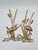 A striking wall decoration made of solid brass, depicting two herons among the reeds by the water’s edge. The piece...