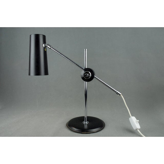 A rare and highly functional example of swedish mid-century modern lighting, this model 782b table lamp was designed by...