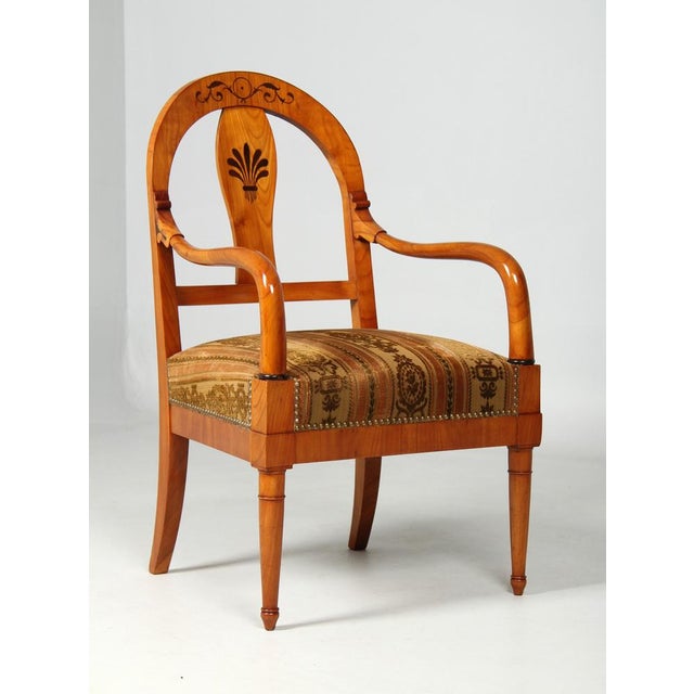 Antique cherry wood armchair south-west germany cherry circa 1830 dimensions: h x w x d: 99 x 58 x 56 cm, seat height: 45...