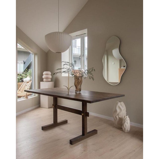 Gaspard Dark Oak and Brass Dining Table 180 by Eberhart Furniture Dimensions: D 180 x W 85 x H 73 cm. Materials: Dark oak,...