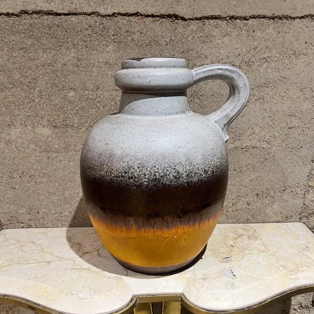 AMBIANIC presents 1960s Vintage Lava Stripe Art Pottery Water Pitcher Speckled Vessel Jug West Germany Stamped on bottom...