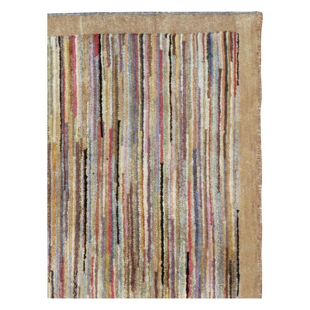 A vintage Chinese Art Deco throw rug handmade during the mid-20th century. The Craft of the hand-knotted carpet in China,...