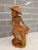An exceptional, highly expressive mid-century Balinese modernist genre realism sculpture depicting a traditional...