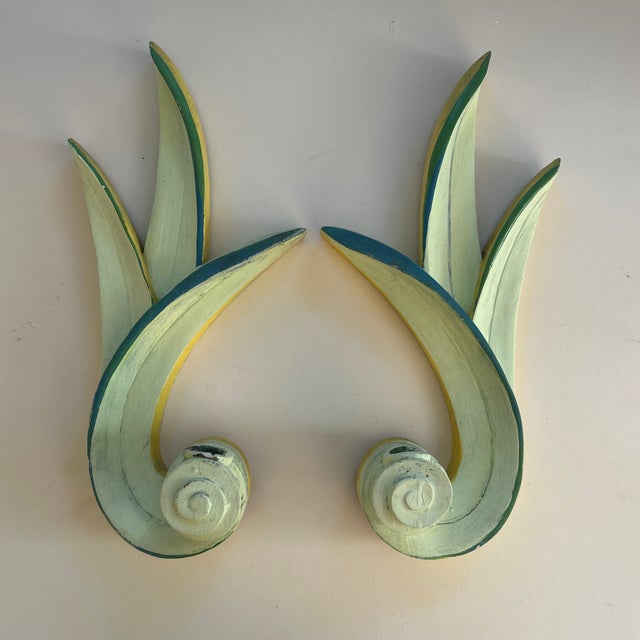 Pair of American 1940s chalk plaster candle wall sconces. Hand painted in shades of green and yellow. They are traditional...