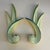 Pair of American 1940s chalk plaster candle wall sconces. Hand painted in shades of green and yellow. They are traditional...