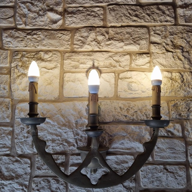 Brass wall light from the 1950s. Up to 250V (Europe/UK Standard).The wiring of this item may be original and might need...