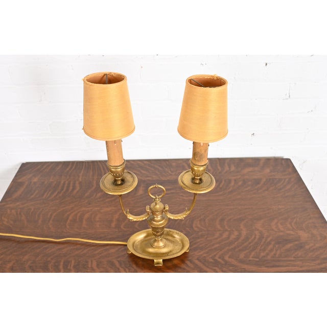 An outstanding Arts & Crafts or Art Deco period gilt bronze two-light table lamp or desk lamp By Tiffany Studios (signed...