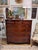 A highly decorative early 19th Century flame mahogany and inlaid bowfront chest of drawers, the figured shaped top above...