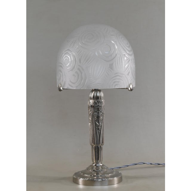 Luiz A wonderful French art deco table lamp made around 1925-1930. A superb nickel plated bronze or solid brass base holds...