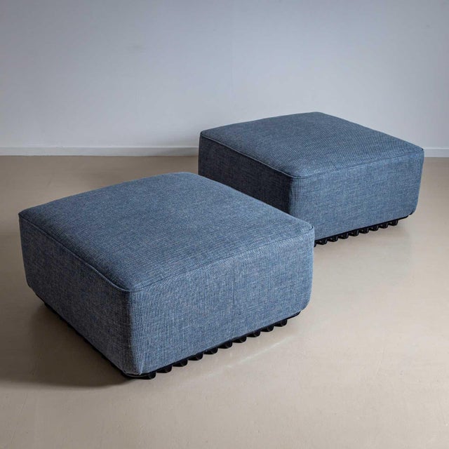 Two square stools or ottomans designed by Titiana Ammannati and Giampiero Vitelli for Brunati Italia. The stools have a...