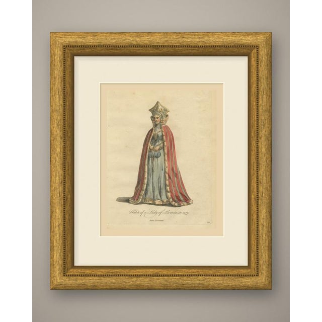 This is an original antique copper engraving with hand coloring, lettered in script "habit of a lady of livonia, in 1577."...