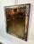 Hand painted, rectangular wooden mirror frame in an oxblood finish with cream-colored accents featuring Chinoiserie...