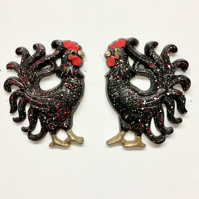 These are a delightful 1950s Mid-Century Pair of Rooster Sculptural Wall Objects. They are painted plaster in red, black...