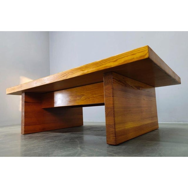 Scandinavian solid pine coffee table from the 1960s featuring a clean, minimalist design. Crafted entirely from solid...