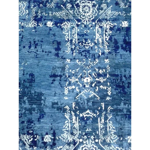 Beautiful hand knotted modern rug. Made of 75% viscose and 25% cotton with very modern design and colors, this extremely...